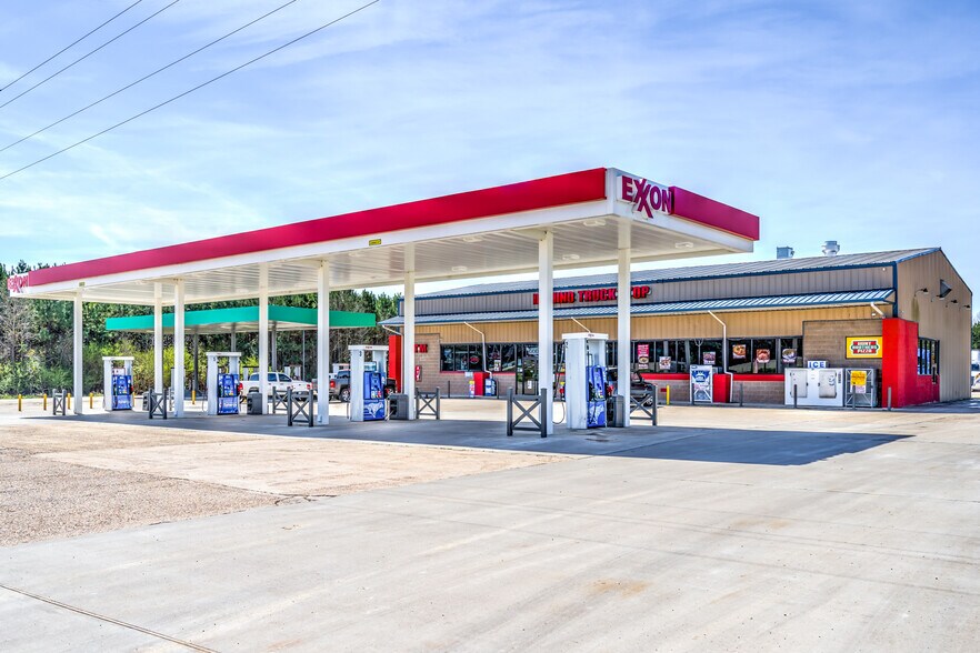 Primary Photo Of 22263 US Highway 59 N, Queen City Service Station For Sale