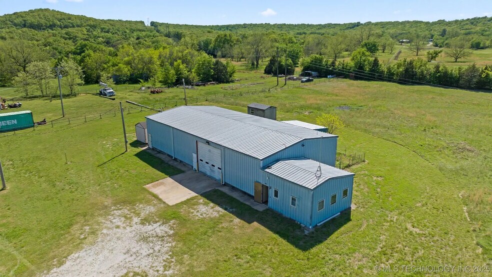 Primary Photo Of 9357 Webster Rd, Beggs Warehouse For Sale