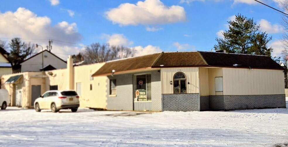 Primary Photo Of 2201 Erie St, Utica Freestanding For Sale