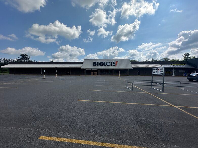 Primary Photo Of 102 Utica St, Hamilton Storefront For Sale