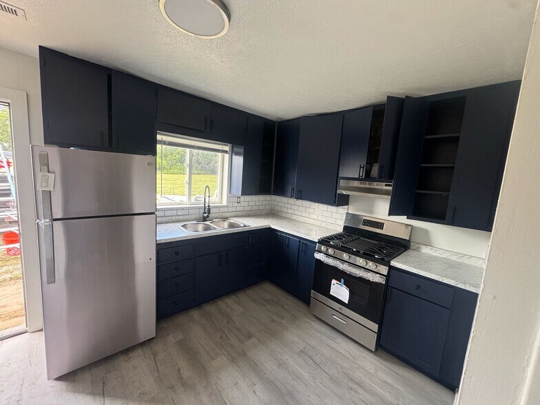 More Photos Of 908 Orange St, Baldwin City Apartments For Sale